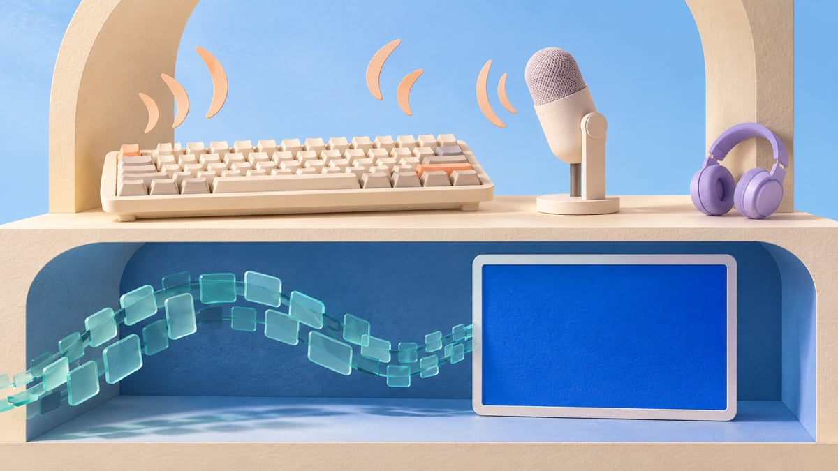 Two-level paper sculpture with a keyboard and microphone above a separate blue screen and teal sound tiles.